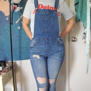 Distressed denim overalls